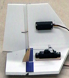 Bevel control surfaces to allow movement.  Make hinges from tape.